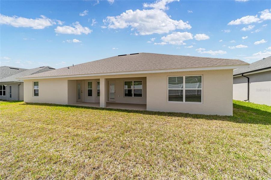 Exterior details and patio area of a home in Brookhaven, Ocala (Image 33).