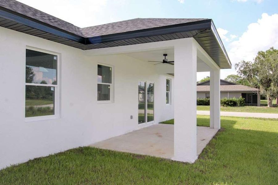 Exterior details and patio area of a home in , Sebring (Image 3).