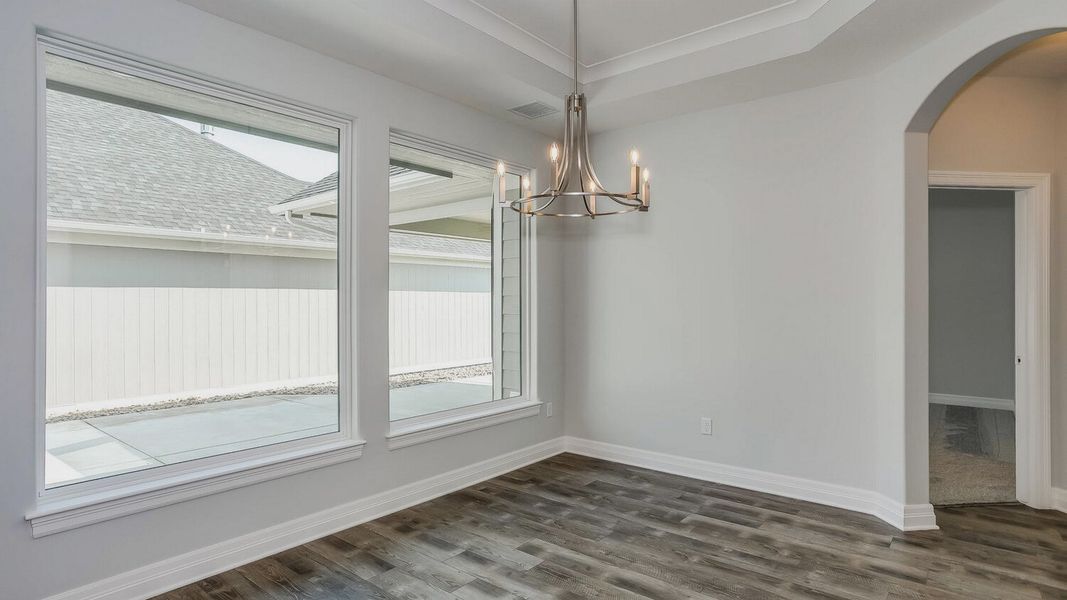 Representative unfurnished interior of a home built from the Portico Tandem Garage by Perfection Builders in The Courtyards at The Heritage, Andover (Image 14).
