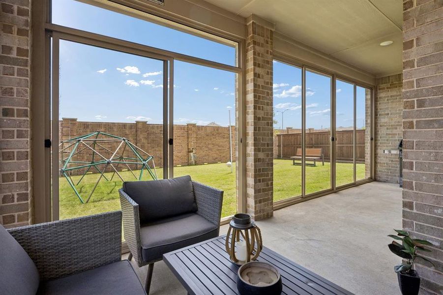 Exterior details and patio area of a home in , Little Elm (Image 22).