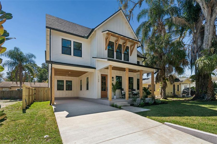 Front exterior of a new home in , Tampa, FL, highlighting curb appeal (Image 29). Front exterior of a new home in , Tampa, FL, highlighting curb appeal (Image 29).