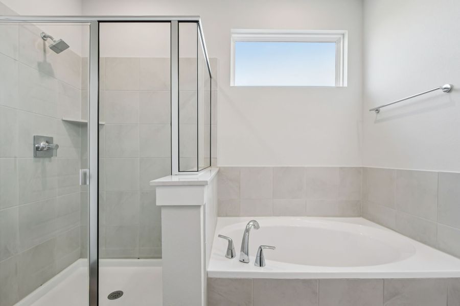 A bathroom with a glass shower.