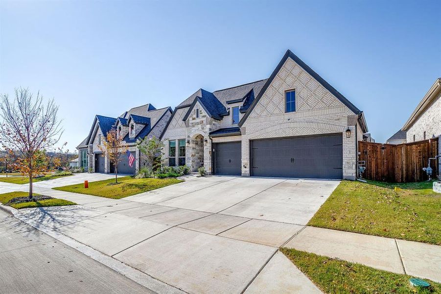 Front exterior of a new home in Walsh 70', Fort Worth, TX, highlighting curb appeal (Image 1).