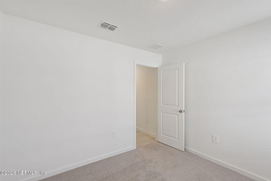 Spacious, unfurnished interior of a new home in Cypress Meadows - Signature Series, Jacksonville (Image 21).