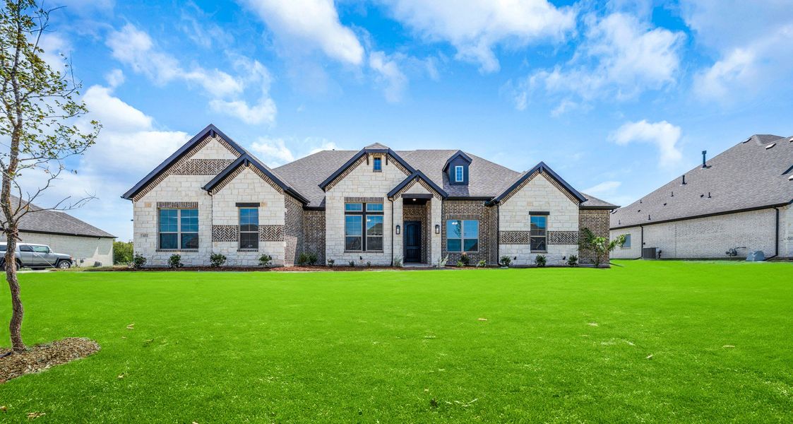 Front exterior of a new home in Creekview Farms, Greenville, TX, highlighting curb appeal (Image 1). Front exterior of a new home in Creekview Farms, Greenville, TX, highlighting curb appeal (Image 1).