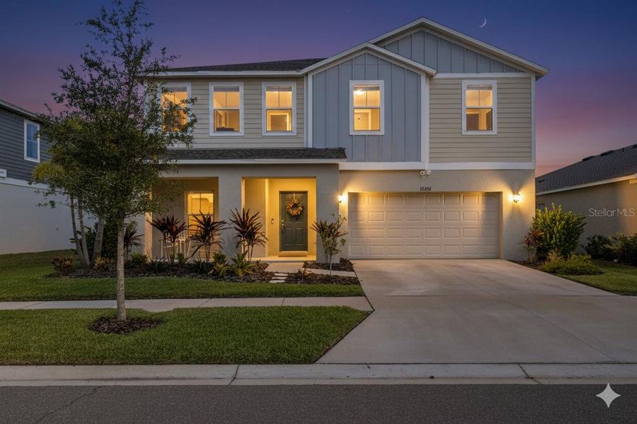 Front exterior of a new home in Hawkstone, Lithia, FL, highlighting curb appeal (Image 1). Front exterior of a new home in Hawkstone, Lithia, FL, highlighting curb appeal (Image 1).