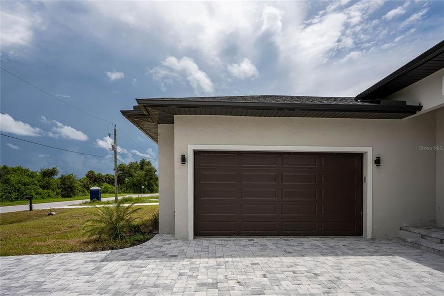 Front exterior of a new home in , Rotonda West, FL, highlighting curb appeal (Image 20).