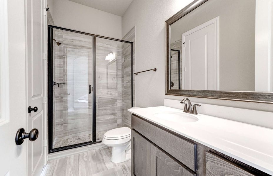 Furnished interior view inside a new home in Bridgeland 60′, Cypress (Image 12).