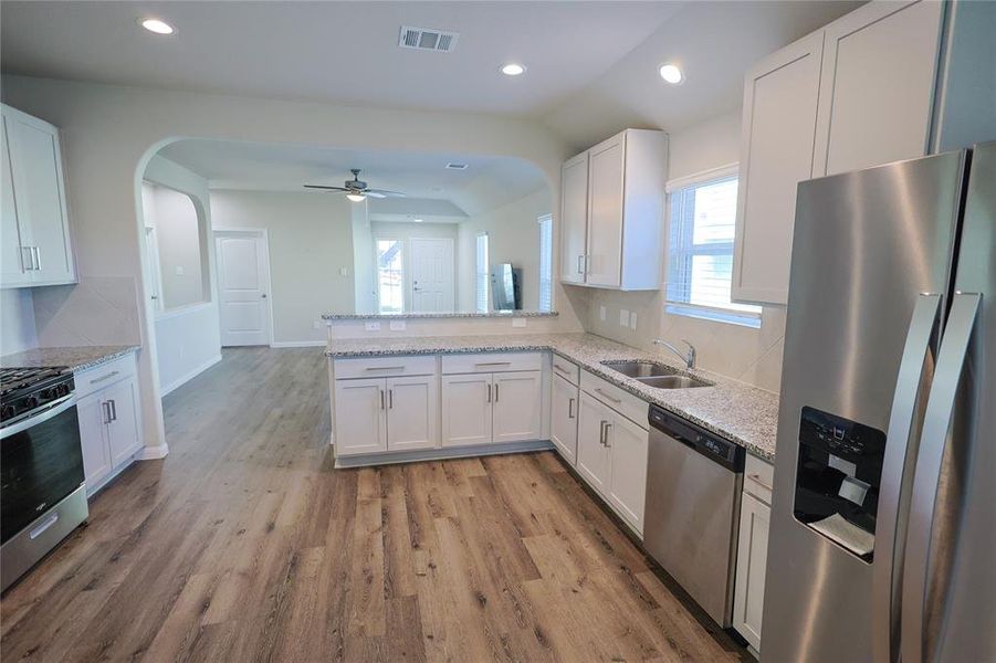 The elevated countertop is perfect for casual dining and entertaining.