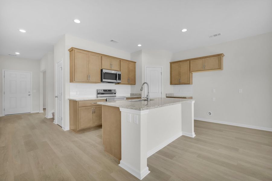 Representative furnished interior of a home built from the The Magnolia by Smith Family Homes in Lakeview Pines, Statesboro (Image 19).