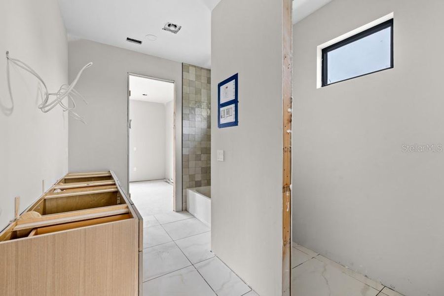 In-progress construction of a new home in , Orlando, FL (Image 25).