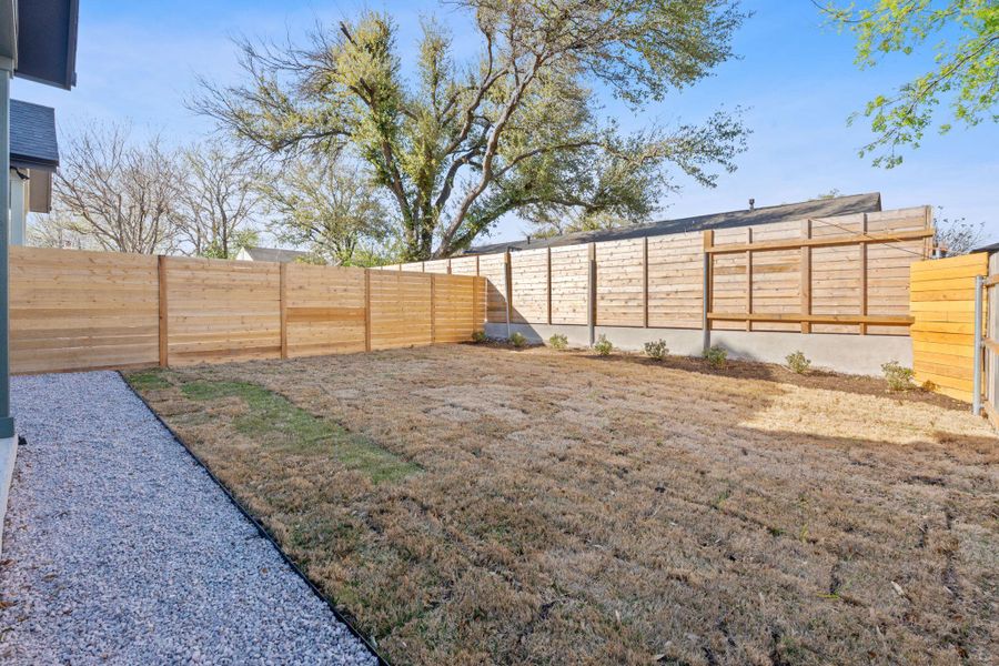 View of yard featuring a fenced backyard