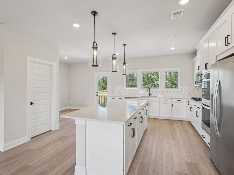 Furnished interior view inside a new home in Hemingway - Highland Series, Cumming (Image 5).