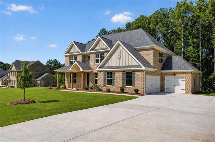 Front exterior of a new home in Patillo Manor, Stockbridge, GA, highlighting curb appeal (Image 16). Front exterior of a new home in Patillo Manor, Stockbridge, GA, highlighting curb appeal (Image 16).