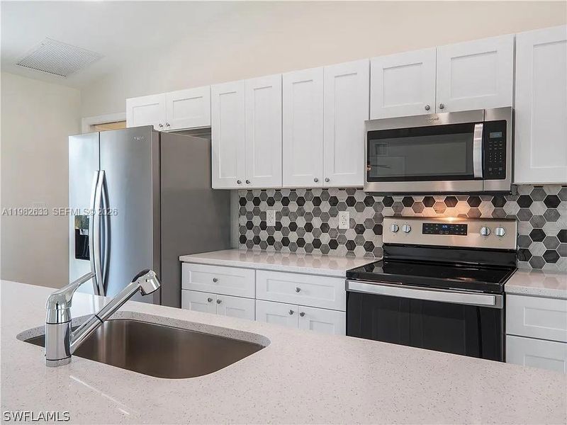 Furnished interior view inside a new home in , Cape Coral (Image 6). Furnished interior view inside a new home in , Cape Coral (Image 6).