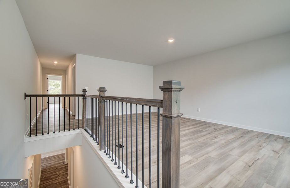 Spacious, unfurnished interior of a new home in Ponderosa Farms Reserve, Gainesville (Image 36).