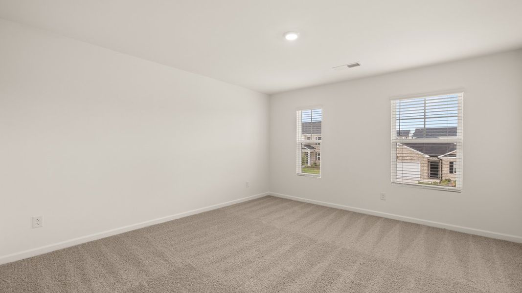 Representative unfurnished interior of a home built from the Hanover by D.R. Horton in The Reserve at Calcutta, Stockbridge (Image 23).