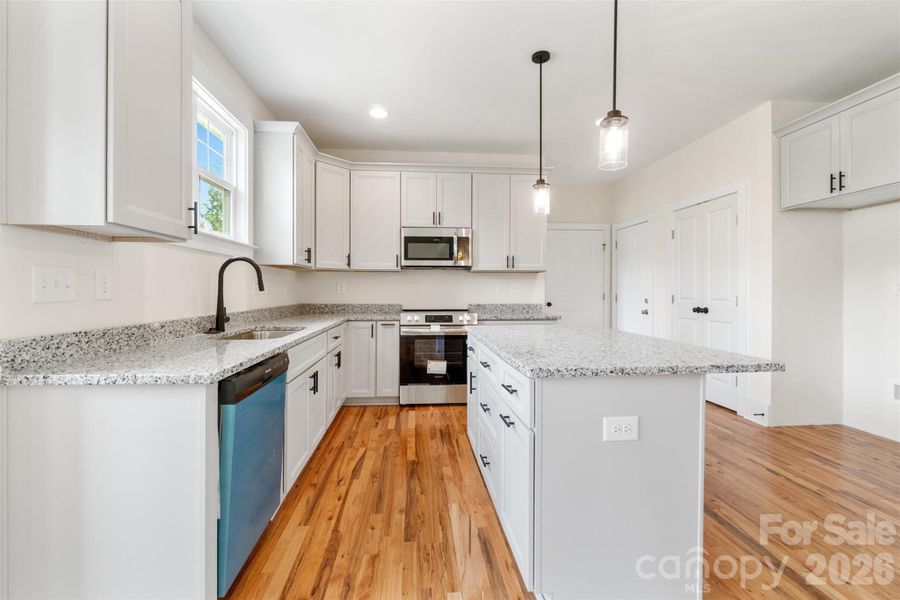 Furnished interior view inside a new home in , Concord (Image 9).