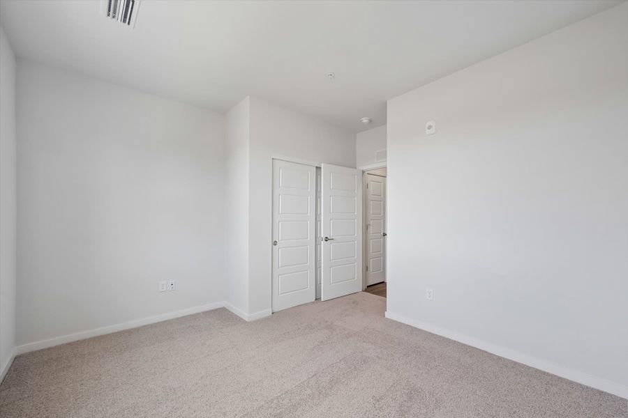 A room with white doors.