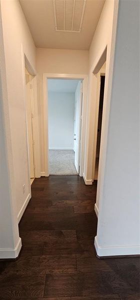 Halway to secondary bedroiom, shower and laundry room