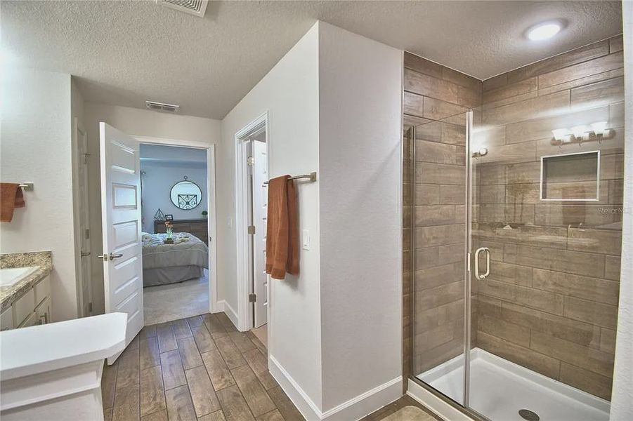 Furnished interior view inside a new home in Magnolia Park, Haines City (Image 34).