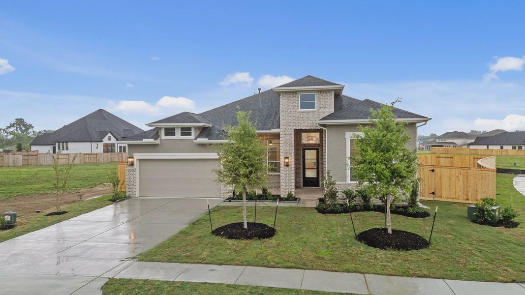 Front exterior of a new home in Briarley, Montgomery, TX, highlighting curb appeal (Image 20). Front exterior of a new home in Briarley, Montgomery, TX, highlighting curb appeal (Image 20).