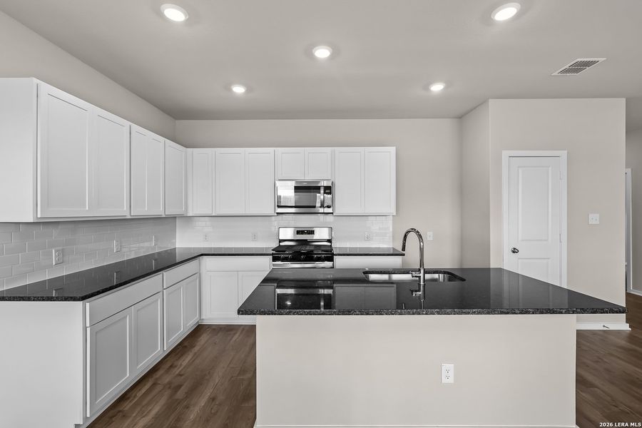 Furnished interior view inside a new home in Garden Grove, San Antonio (Image 6).