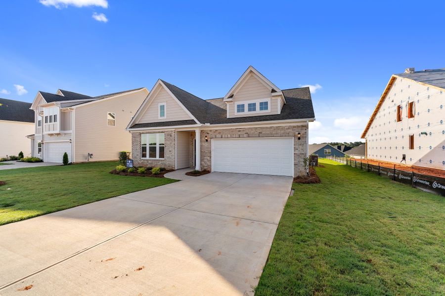 Front exterior of a new home in Cottages at Lake Emory, Inman, SC, highlighting curb appeal (Image 2). Front exterior of a new home in Cottages at Lake Emory, Inman, SC, highlighting curb appeal (Image 2).