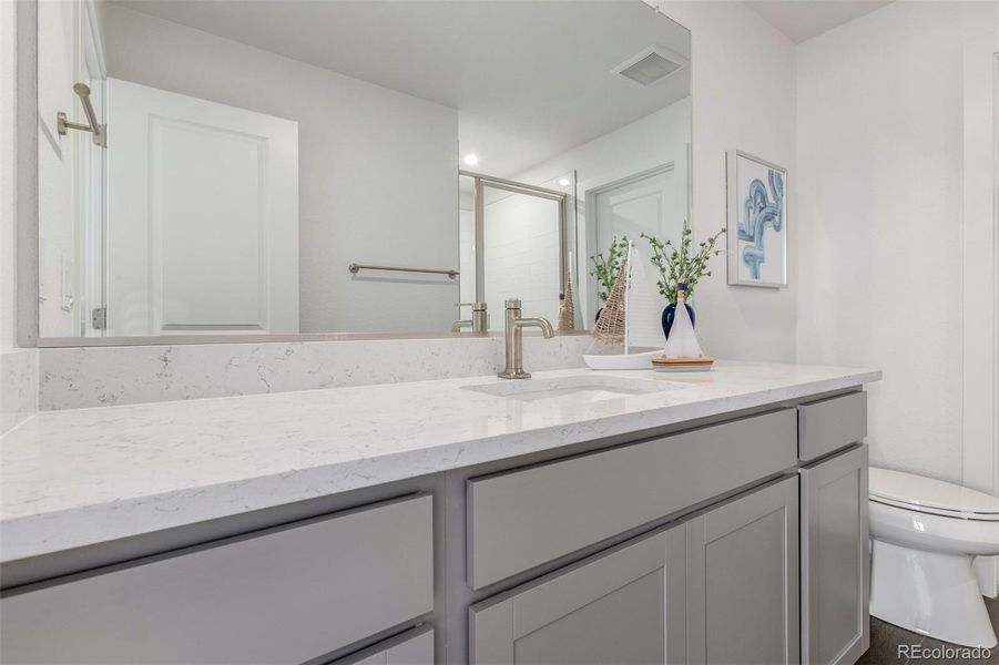 Furnished interior view inside a new home in The Commons at Victory Ridge, Colorado Springs (Image 29).