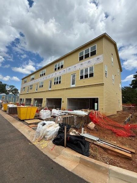 Front exterior of a new home in East Park Village, Kennesaw, GA, highlighting curb appeal (Image 25).
