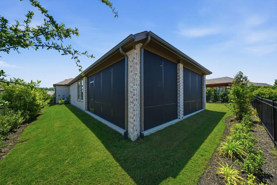 Exterior details and patio area of a home in Chambers Creek, Willis (Image 4). Exterior details and patio area of a home in Chambers Creek, Willis (Image 4).