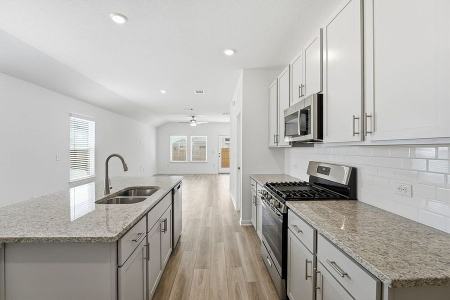Furnished interior view inside a new home in Longview, Del Valle (Image 7).
