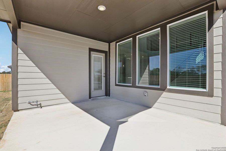 Exterior details and patio area of a home in Carmel Ranch, Schertz (Image 27).