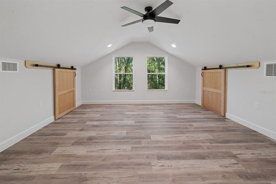 Spacious, unfurnished interior of a new home in , Bell (Image 34).