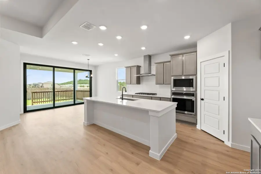 Furnished interior view inside a new home in Hunter's Ranch, San Antonio (Image 5).