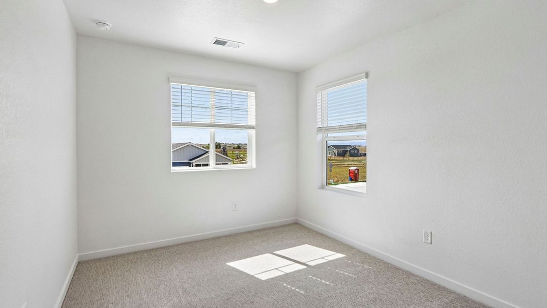 Spacious, unfurnished interior of a new home in Prairie Song, Windsor (Image 21).
