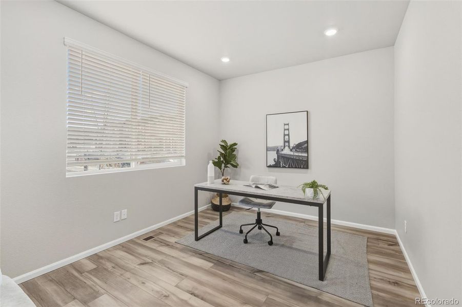 Furnished interior view inside a new home in Woodrose at Painted Prairie, Aurora (Image 15).