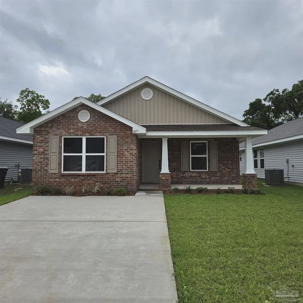 Front exterior of a new home in Westpointe Place, Pensacola, FL, highlighting curb appeal (Image 1). Front exterior of a new home in Westpointe Place, Pensacola, FL, highlighting curb appeal (Image 1).