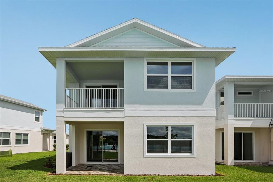 Front exterior of a new home in Lagoon Residences at Epperson, Wesley Chapel, FL, highlighting curb appeal (Image 2).