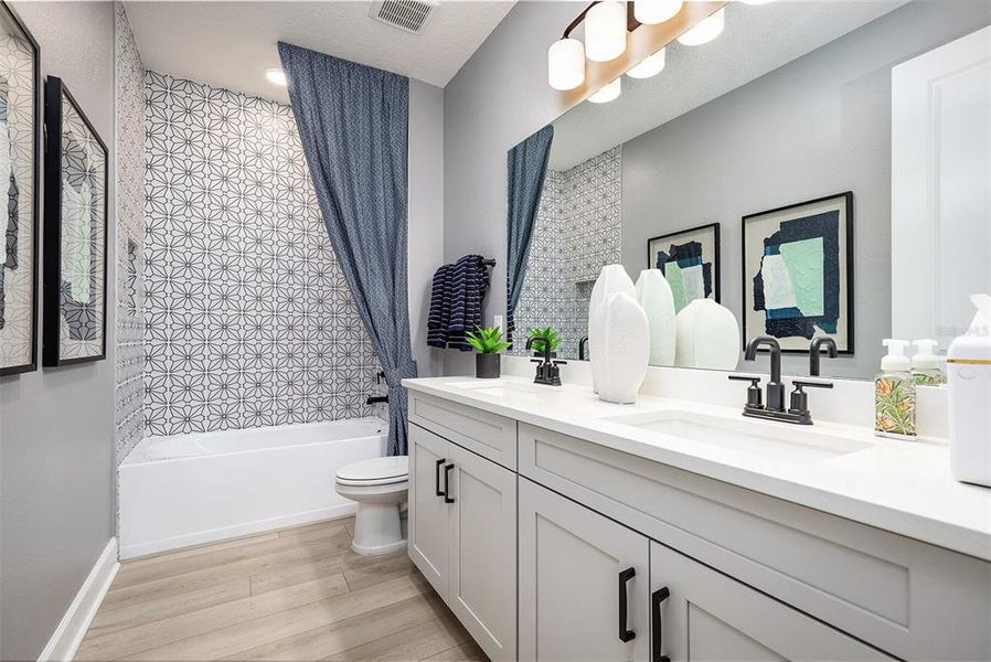 Furnished interior view inside a new home in Emerson Pointe, Apopka (Image 28). Furnished interior view inside a new home in Emerson Pointe, Apopka (Image 28).