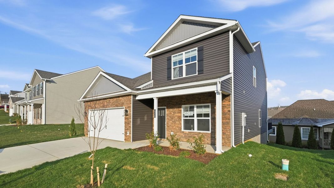 Front exterior of a new home in Polo Fields, Kingsport, TN, highlighting curb appeal (Image 2).