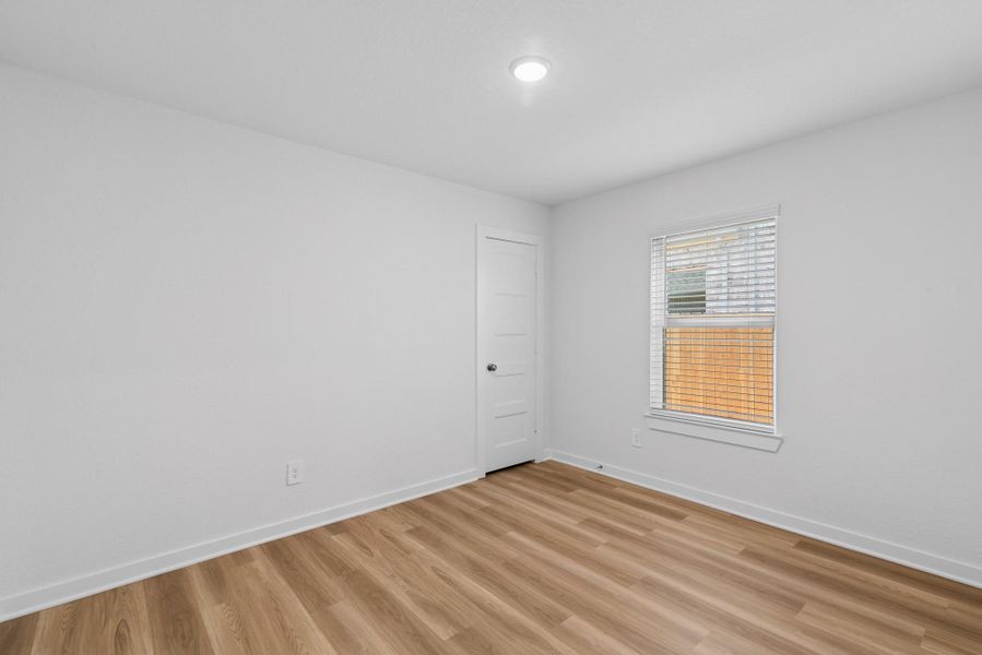 Spacious, unfurnished interior of a new home in Wildrye, Waller (Image 24).