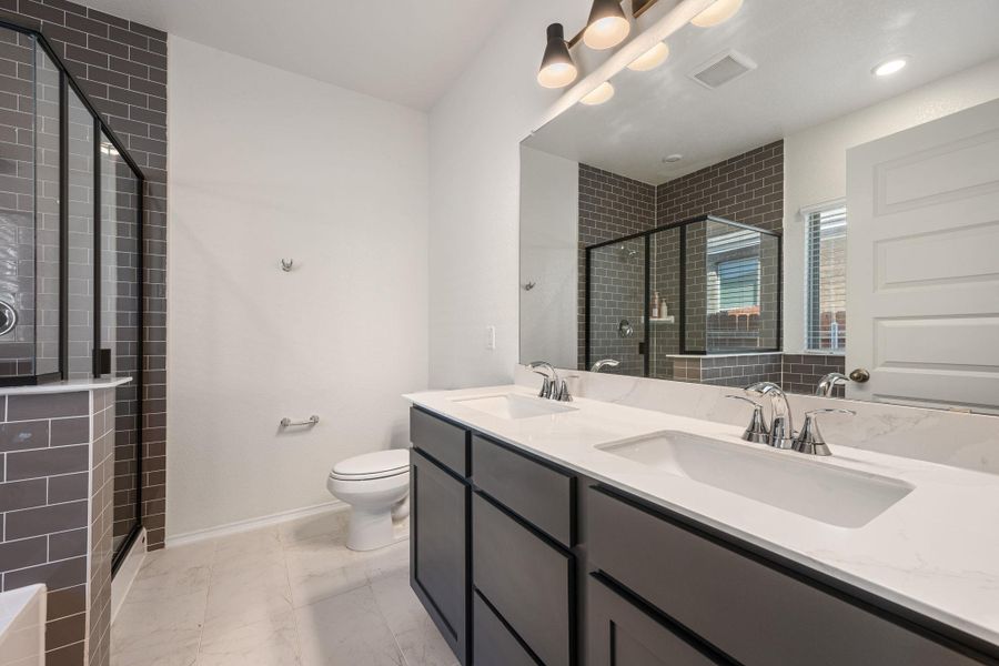 Upgraded Tile, Fixtures, and Cabinets Upgraded Tile, Fixtures, and Cabinets