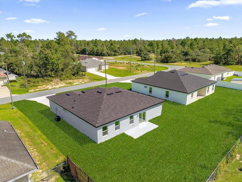 Front exterior of a new home in , Ocala, FL, highlighting curb appeal (Image 26).