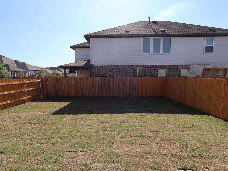 Exterior details and patio area of a home in Heritage, Dripping Springs (Image 3).