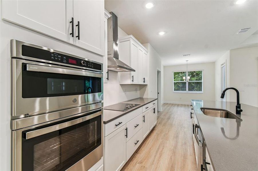 Furnished interior in a model home at Hidden Ridge in New Port Richey (Image 7).