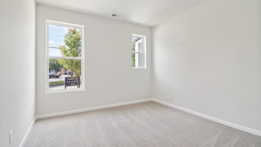 Spacious, unfurnished interior of a new home in Townes at Asbury, Hapeville (Image 24).