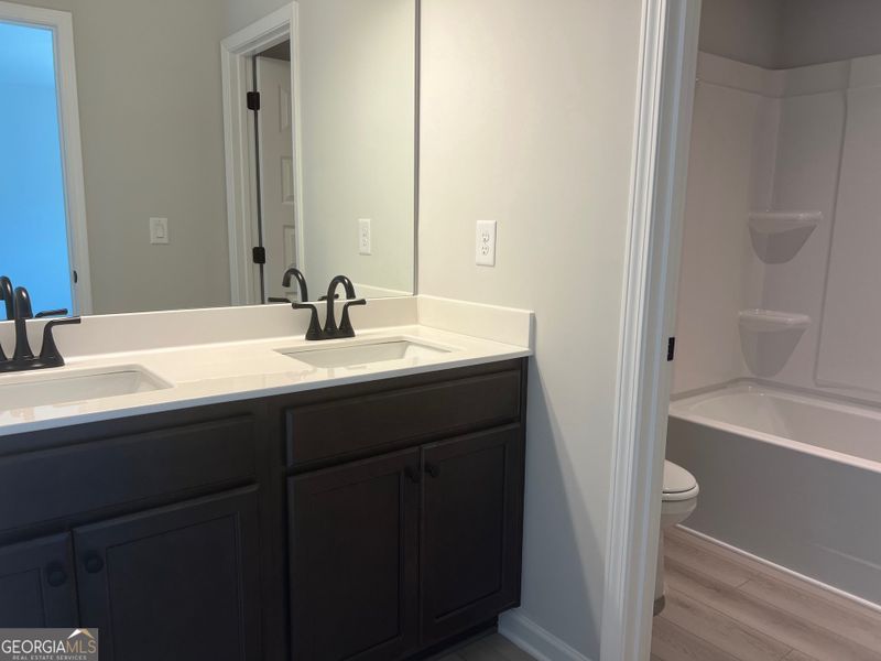 Furnished interior view inside a new home in Crofton Place Enclave, Snellville (Image 12).