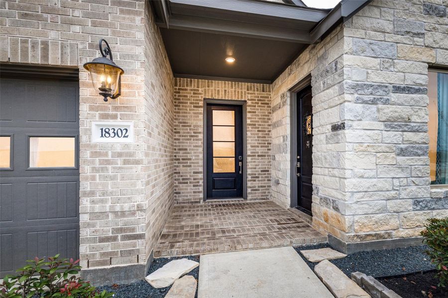 Exterior details and patio area of a home in Anniston, Katy (Image 3).