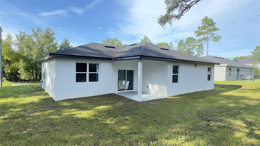 Front exterior of a new home in , Citrus Springs, FL, highlighting curb appeal (Image 17). Front exterior of a new home in , Citrus Springs, FL, highlighting curb appeal (Image 17).